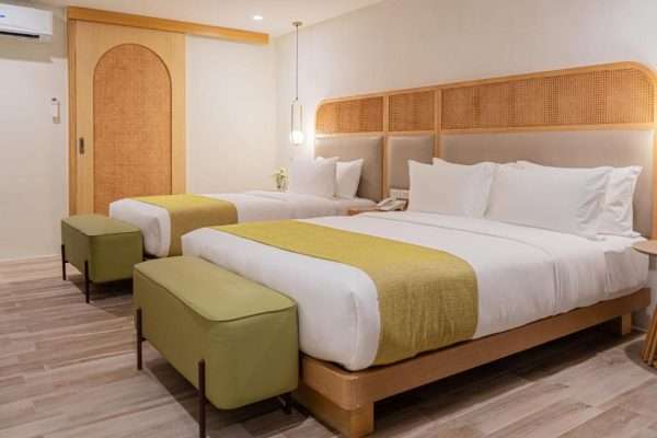 deluxe room bed mandarin nest